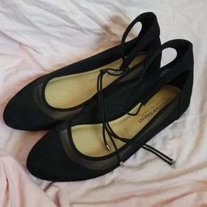 Black flats with an ankle straps